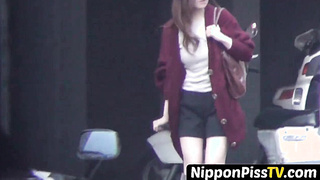 NipponPissTV.com - Japanese amateur babe pissing like a naughty lady she is in public