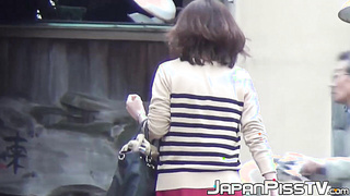 Couple of hairy pussy asian babes public peeing close up