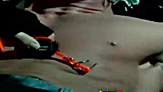 Muscle jock tied up with fat rope during outdoor BDSM