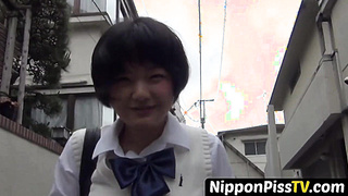 NipponPissTV.com - Pretty Japanese babe with hairy pussy pissing hard outdoors