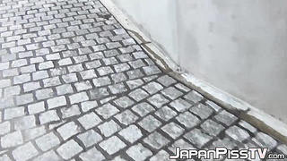 Japanese babes filmed on [censored] while peeing outdoors