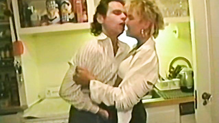 Attractive blonde woman takes it from behind in bed