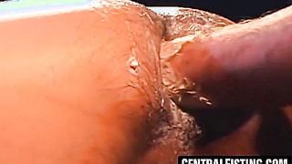 CentralFisting.com - Master's fists plunge jock Hernando's ass