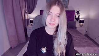 Big tits teen spreads pussy