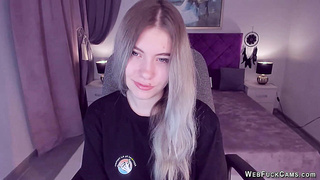 Big tits teen spreads pussy