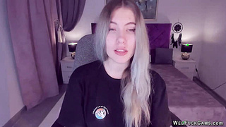 Big tits teen spreads pussy