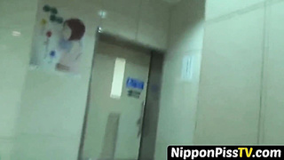 NipponPissTV.com - Urinating Chinese stunner luving her time in public toilette openly
