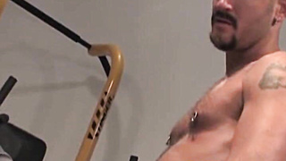 Back in the gym, cream-colored red-haired Tim Rusty pumps away at thepreacher curl while Joey O'Bryan works his gam raises.