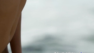 Brief haired hottie Ariel A flaunts her spunky assets on the shoreline