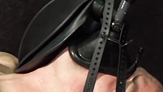 Beefy Bigg Pete can only squeal in anguish thru his gag as his humungous ballsack are pulled