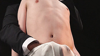 Ethan Tate fulfills his tormentor's lewd wish in the darkroom