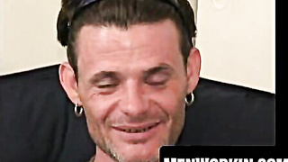 Bearded pillow-biter demonstrates tatts while milking manhood rock-hard