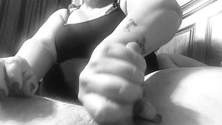 Cougar plays with man sausage during delicious hand job