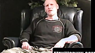 Smooth-shaven thug jacks off and ejaculates on a plate solo