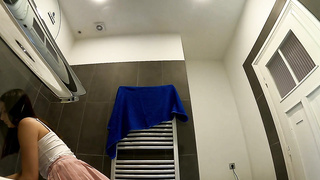 Bare-chested warm dark haired thin and naughty stunner in a pinkish mini micro-skirt to flash her fantastic rump and gams