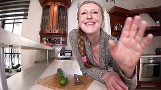 Aged Grandmother kitchen onanism joy with a cucumber
