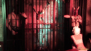 2 prisoners get their pricks deepthroated by a black-haired damsel before drilling her