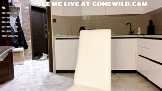 Thin Blond in Wool Coat Displays Culo in Kitchen Web cam