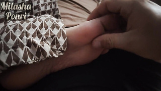 Step-sister's soles get a light rubdown while seeing a video