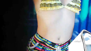 Hidden Cam at the suntanned teenage in the beach cabin