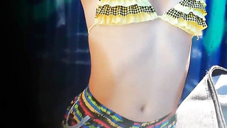 Hidden Cam at the suntanned teenage in the beach cabin