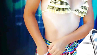 Hidden Cam at the suntanned teenage in the beach cabin