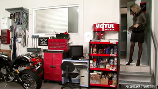 Magnificent towheaded nymph is providing a deep fellatio to a ultra-kinky fellow, in a garage