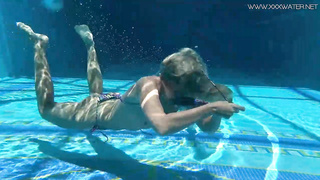 Mary Kalisy is lovin’ next to the swimming pool, thinking about a fellow she wants to poke