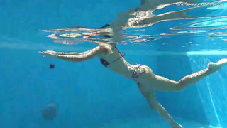 Mary Kalisy is lovin’ next to the swimming pool, thinking about a fellow she wants to poke