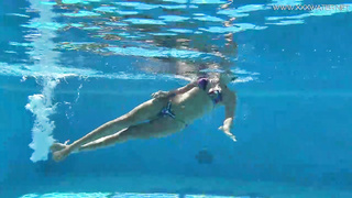 Mary Kalisy is lovin’ next to the swimming pool, thinking about a fellow she wants to poke