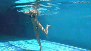 Mary Kalisy is lovin’ next to the swimming pool, thinking about a fellow she wants to poke