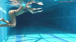 Mary Kalisy is lovin’ next to the swimming pool, thinking about a fellow she wants to poke