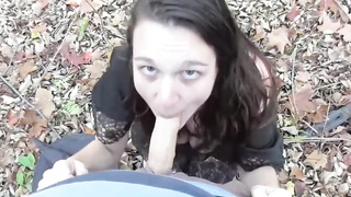 Girl with filthy ideas on her mind is gargling lollipop in the woods, just for joy