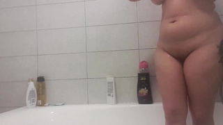 Mature, light-haired dame with phat globes is making enjoy with her hubby in the tub bath