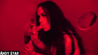 Dark haired stunner is throating a random dude's manmeat thru a gloryhole and listening to his yells