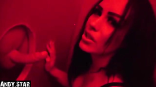 Dark haired stunner is throating a random dude's manmeat thru a gloryhole and listening to his yells