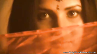 Indian female is dressed in an exotic costume while dancing and getting prepared for a sensuous poke