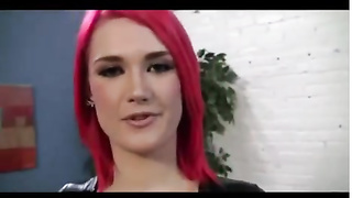 Crimson haired honey in a ebony costume, Siri is displaying her knockers and getting nailed rigid