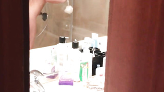 Freak films blond chick during climax in motel bathroom