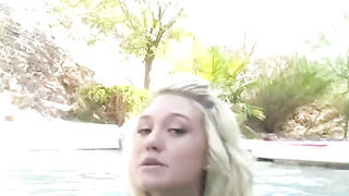 Huge-Titted teenager in the pool