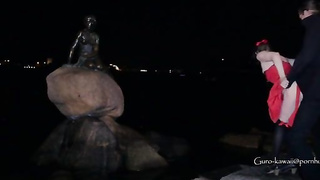 Whorish black-haired in a luxurious, crimson sundress is getting on all fours on the floor and throating a stranger's salami