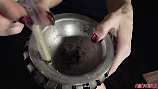 Blond stunner is smoking pot and opening up up broad to display vulva, just for joy