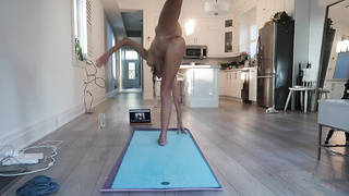 Small, fledgling platinum-blonde is having her bare yoga sesh in front of the camera, just for joy