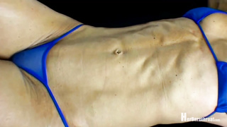 Fit female, Baile is posing in a little bathing suit and from time to time even being a ultra-kinky woman