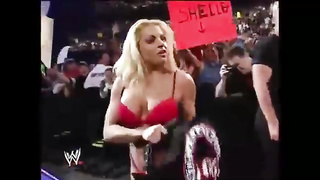 Trish Stratus and Terri Runnels are grappling in front of many people and getting enormously aroused