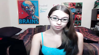 Bony teenage brown-haired with glasses, Alexxx Coal is toying with herself in front of the web camera