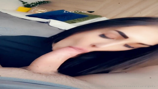 Marvelous chick is delicately deep throating a rock rock-hard prick in front of the camera, just for joy