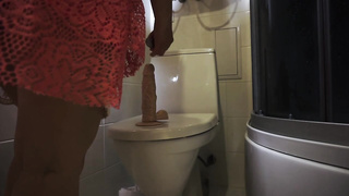 Round teenage black-haired with a thick ass is stroking in the shower and shrieking while spunking