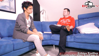 Brief haired dark haired is providing a deep blow-job to one of the neighbors, in her living guest room