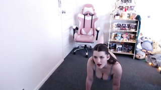 Big-Boobed brown-haired is doing her faux exercise routine on live webcam and taking off her clothes
